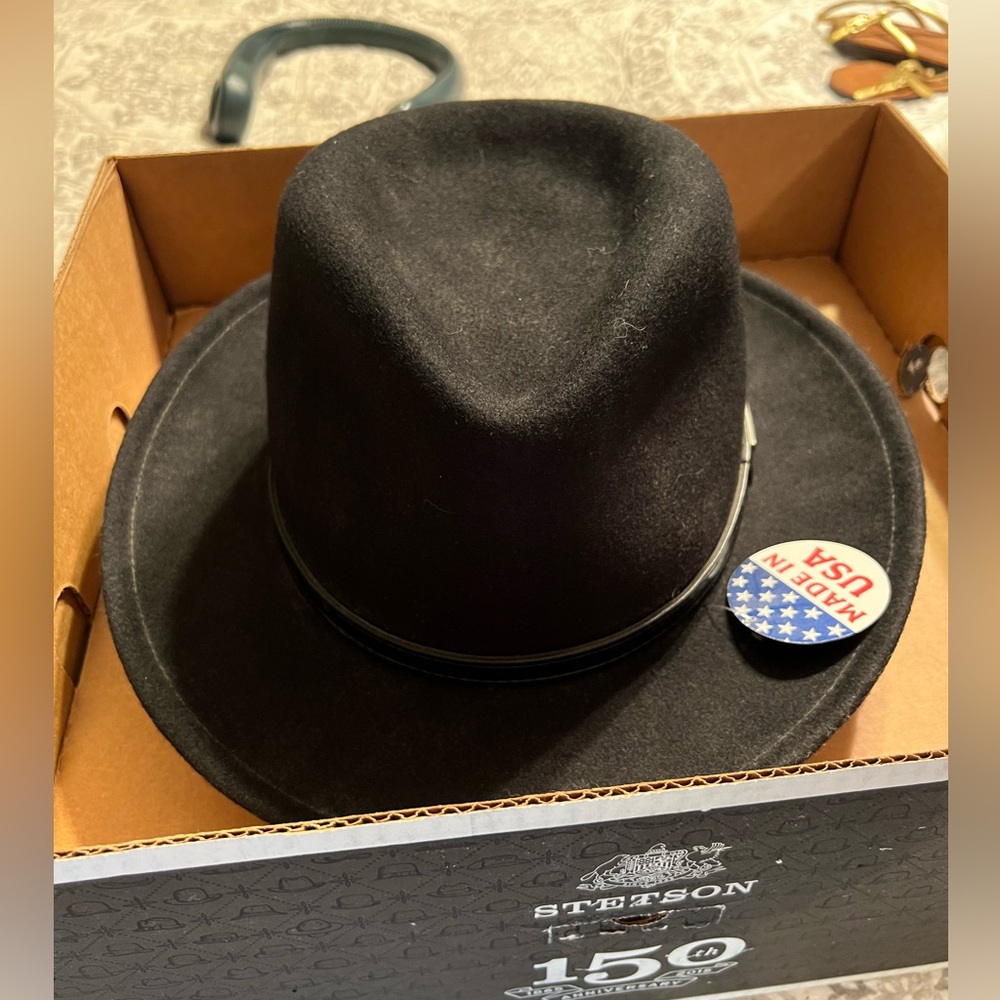 brand new, never worn, black Stetson hat.